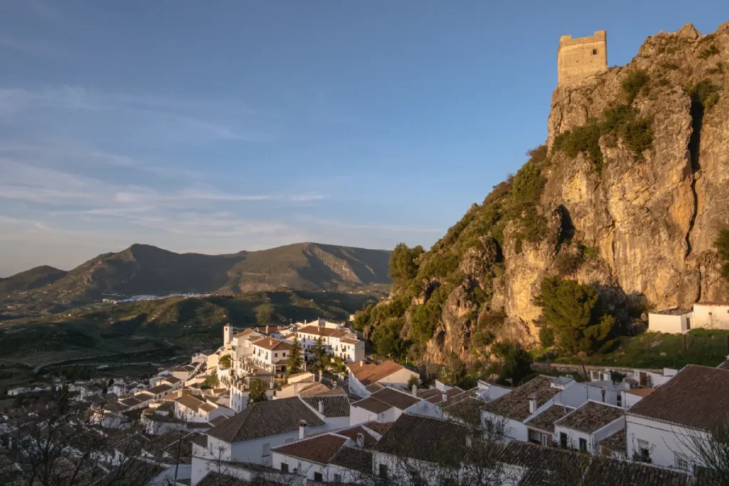 Zahara de la Sierra at sunset with its castle tower on the crag