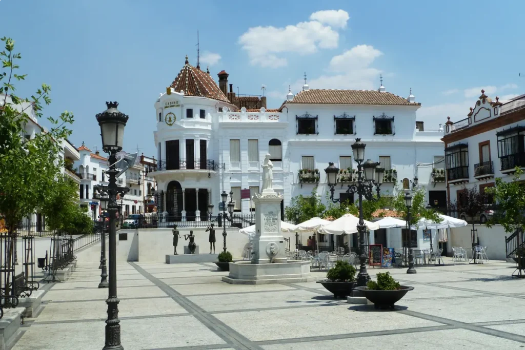 The main square of Aracena, lined with whitewashed houses