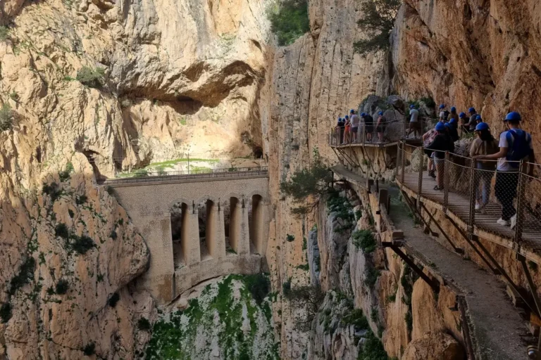 The Caminito del Rey walkway pinned high on the cliff above the gorge