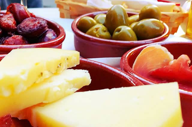 Cheese, chorizo and olives served as tapas in Seville