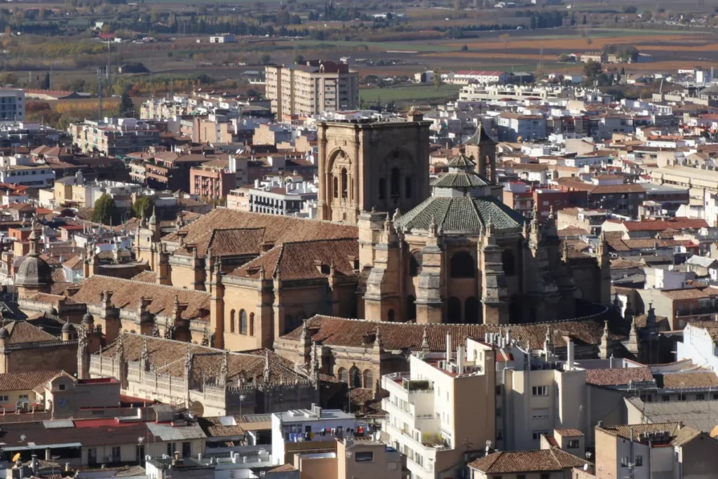 View across the rooftops of Granada with the cathedral rising above them