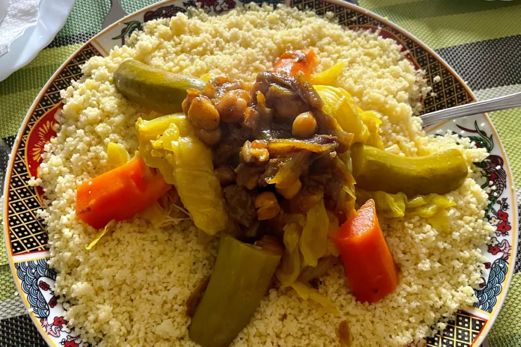 Plate of Moroccan couscous with vegetables served at a traditional restaurant