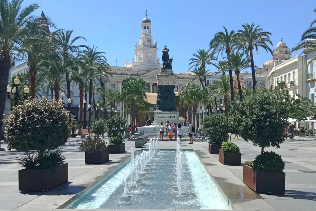Palm trees and fountains in Plaza de San Juan de Dios in Cadiz