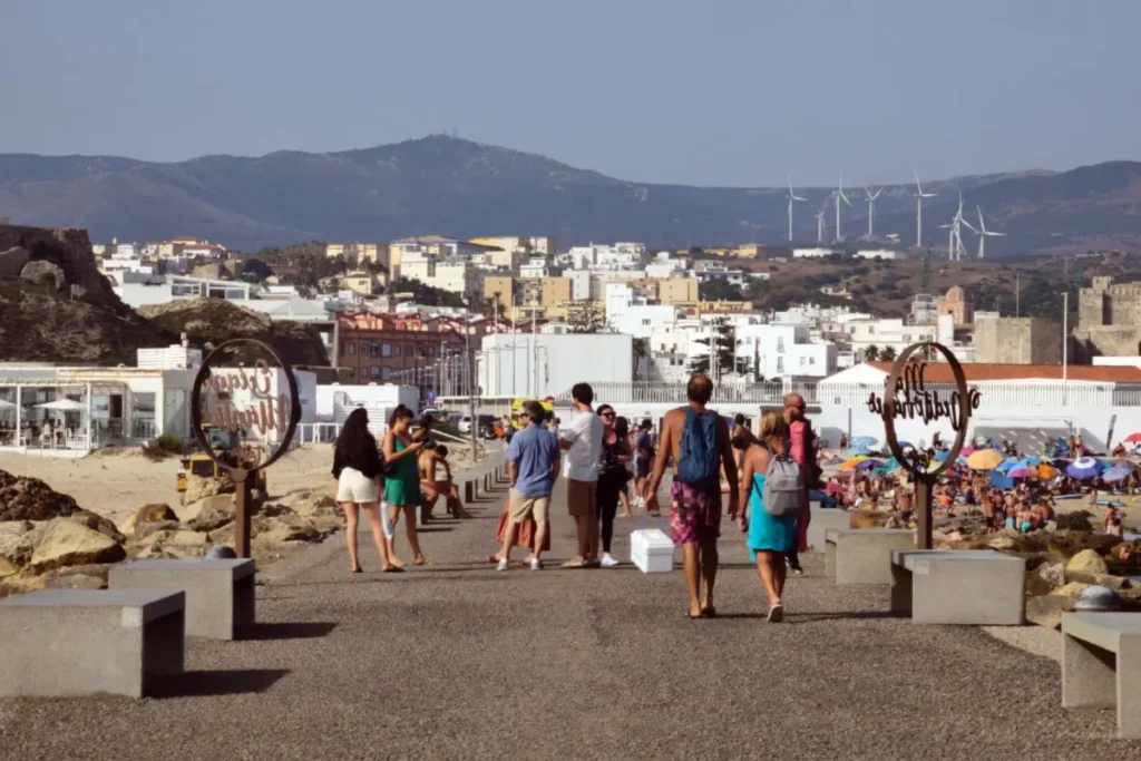 Seafront promenade in Tarifa on a busy summer day