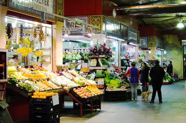 Stalls inside the covered market of Triana in Seville